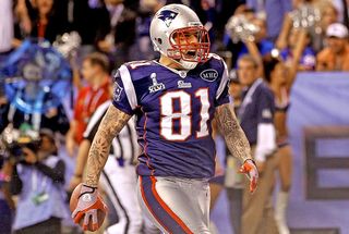 Aaron Hernandez playing for the New England Patriots in 2012. Hernandez died from suicide on April 19, 2017.