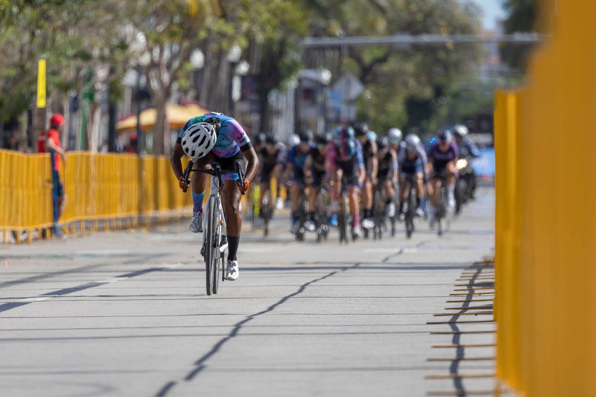 A Monarch Cycling rider breaks away at the front of the women's race
