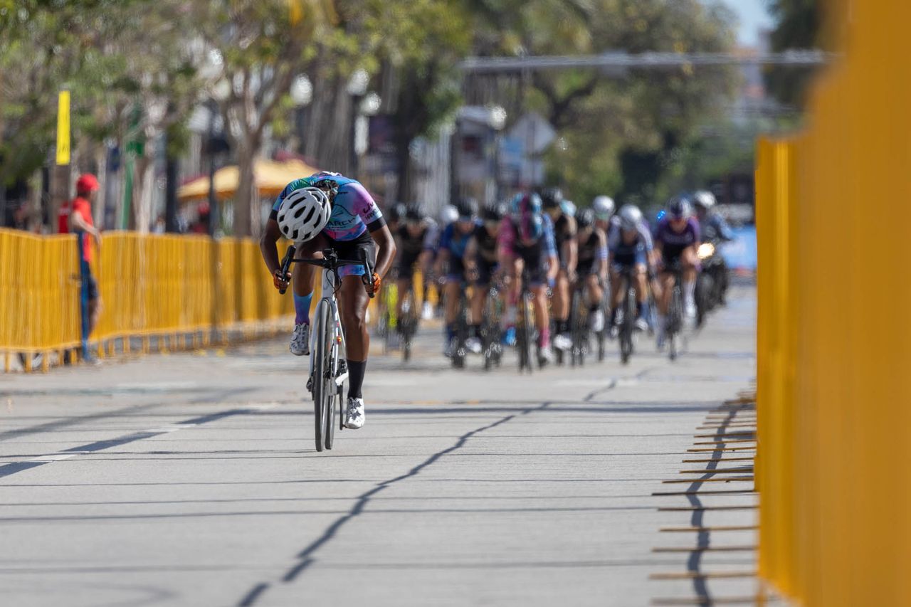 A Monarch Cycling rider breaks away at the front of the women's race