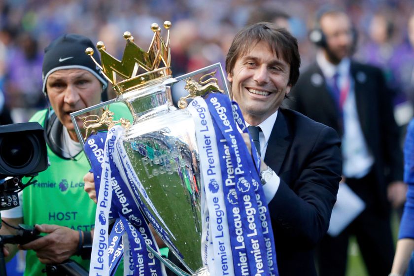 Chelsea manager Antonio Conte holds the Premier League trophy, 2017