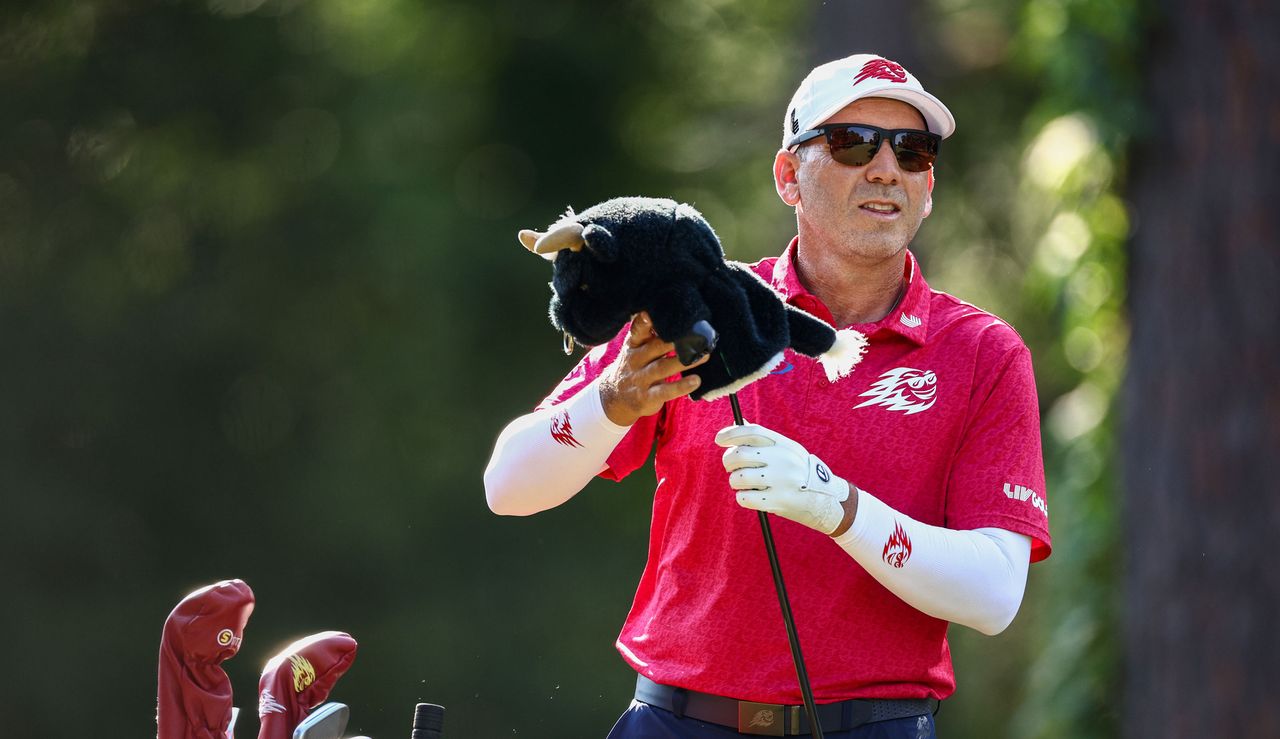 Sergio Garcia takes his headcover off his driver