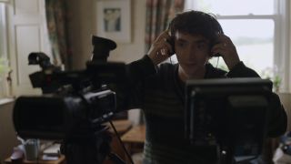 Samuel Blenkin as Davis from behind the camera in the Black Mirror Season 6 episode, Loch Henry