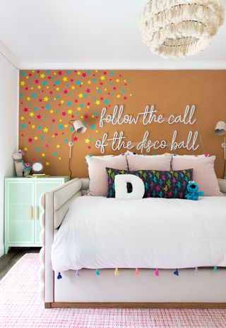 kids bedroom with orange wall