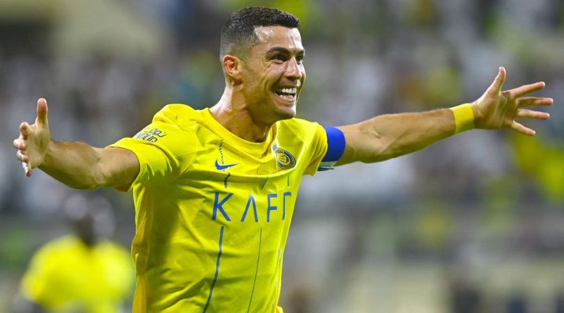  Cristiano Ronaldo celebrates after scoring during the Saudi Pro League football match between Al-Nassr and Al-Fateh at the Prince Abdullah Bin Jalawi Stadium in al-Hasa, on August 25, 2023. (Photo by Ali Al-HAJI / AFP) (Photo by ALI AL-HAJI/AFP via Getty Images)