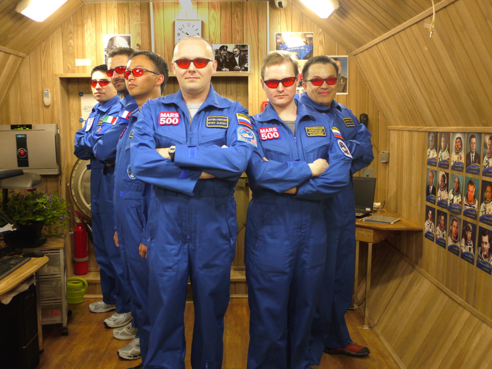 The Mars500 crew poses for a fun portrait with red protective goggles. 