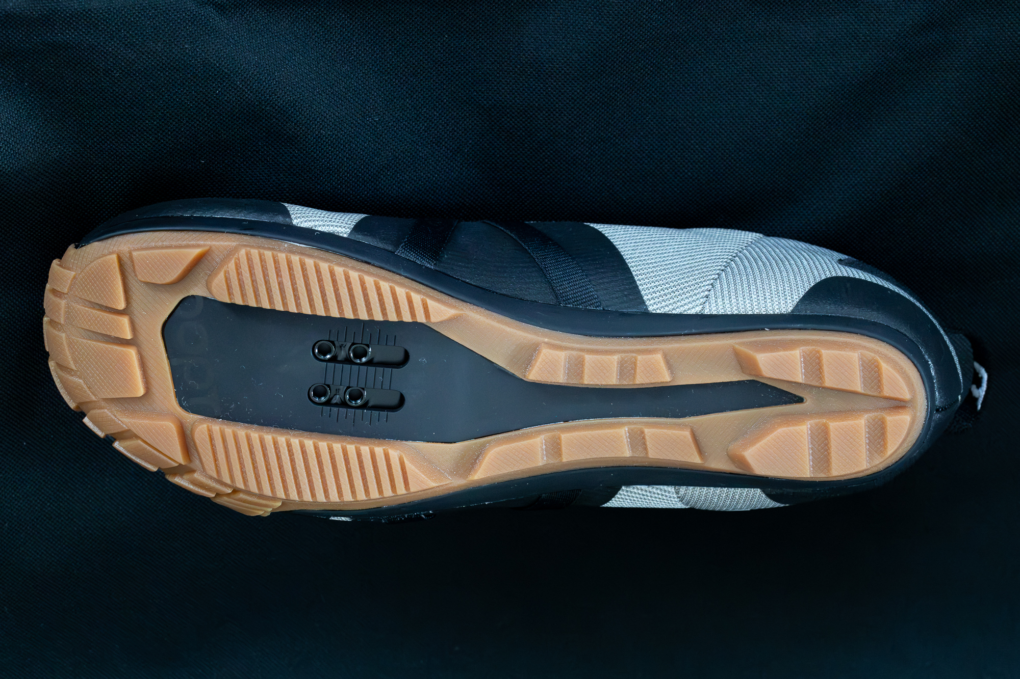 close up the sole of a grey cycling shoe