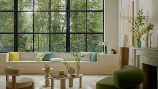 living room with crittall style window and beige soda