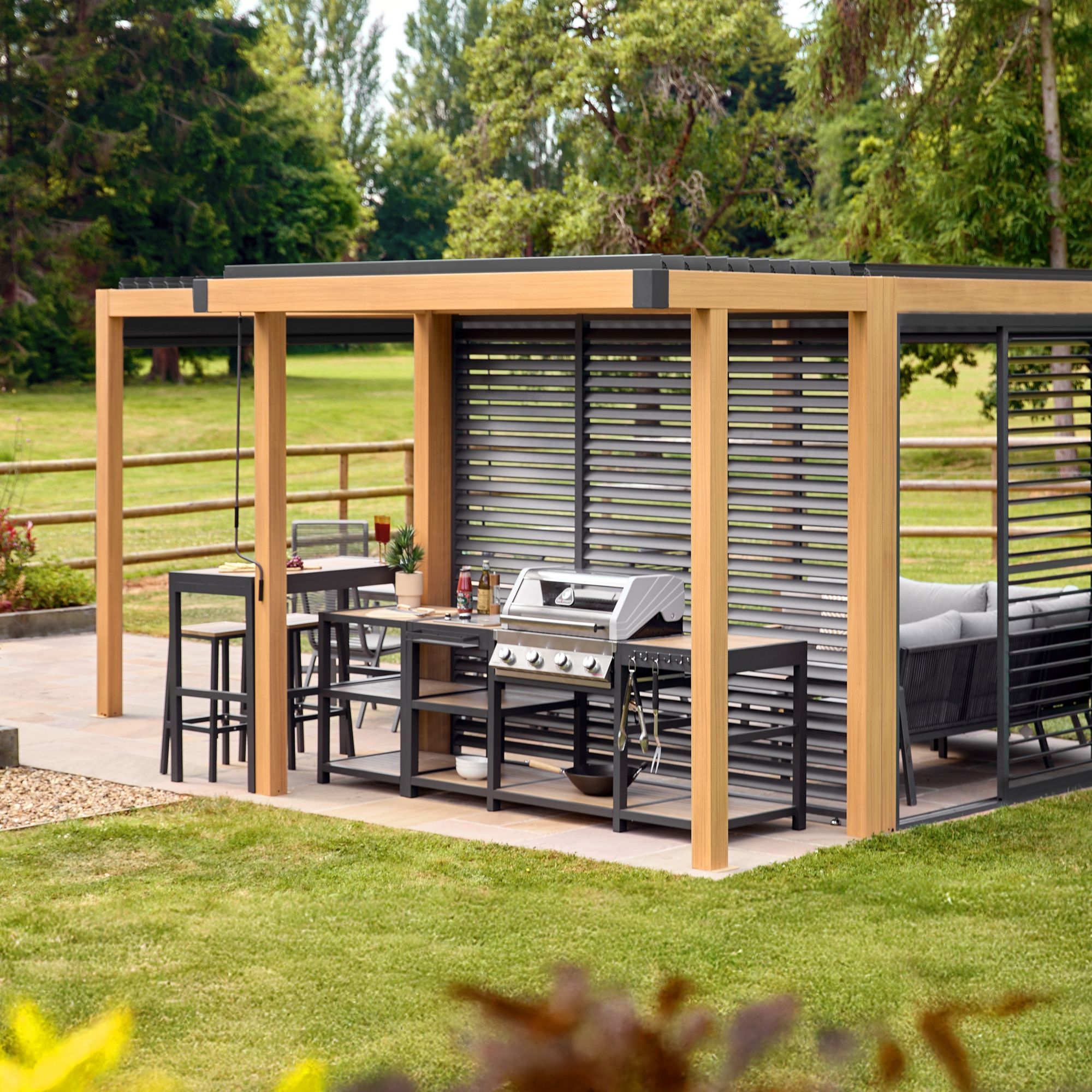 wooden and aluminium pergola structure with barbeque