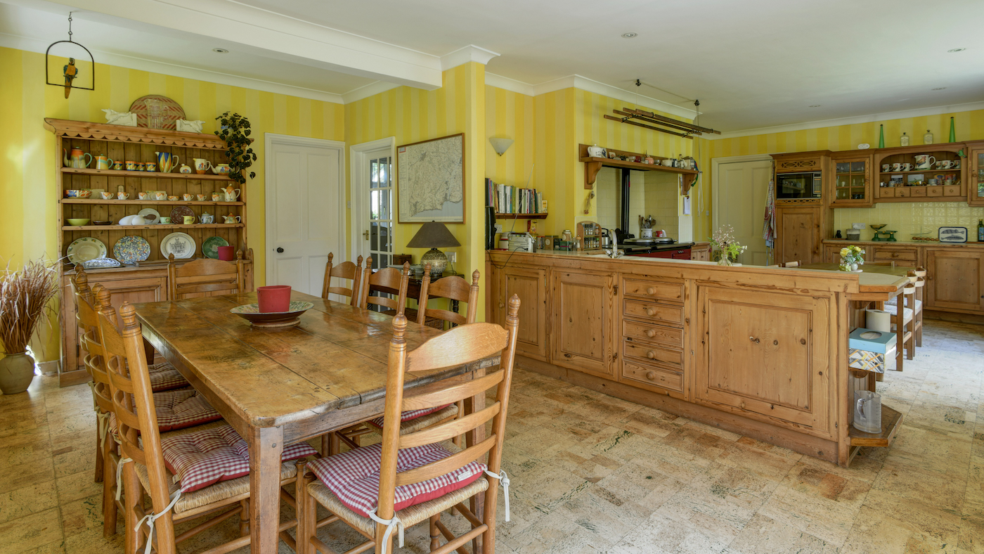 Painted yellow kitchen at Lovehayne Farm