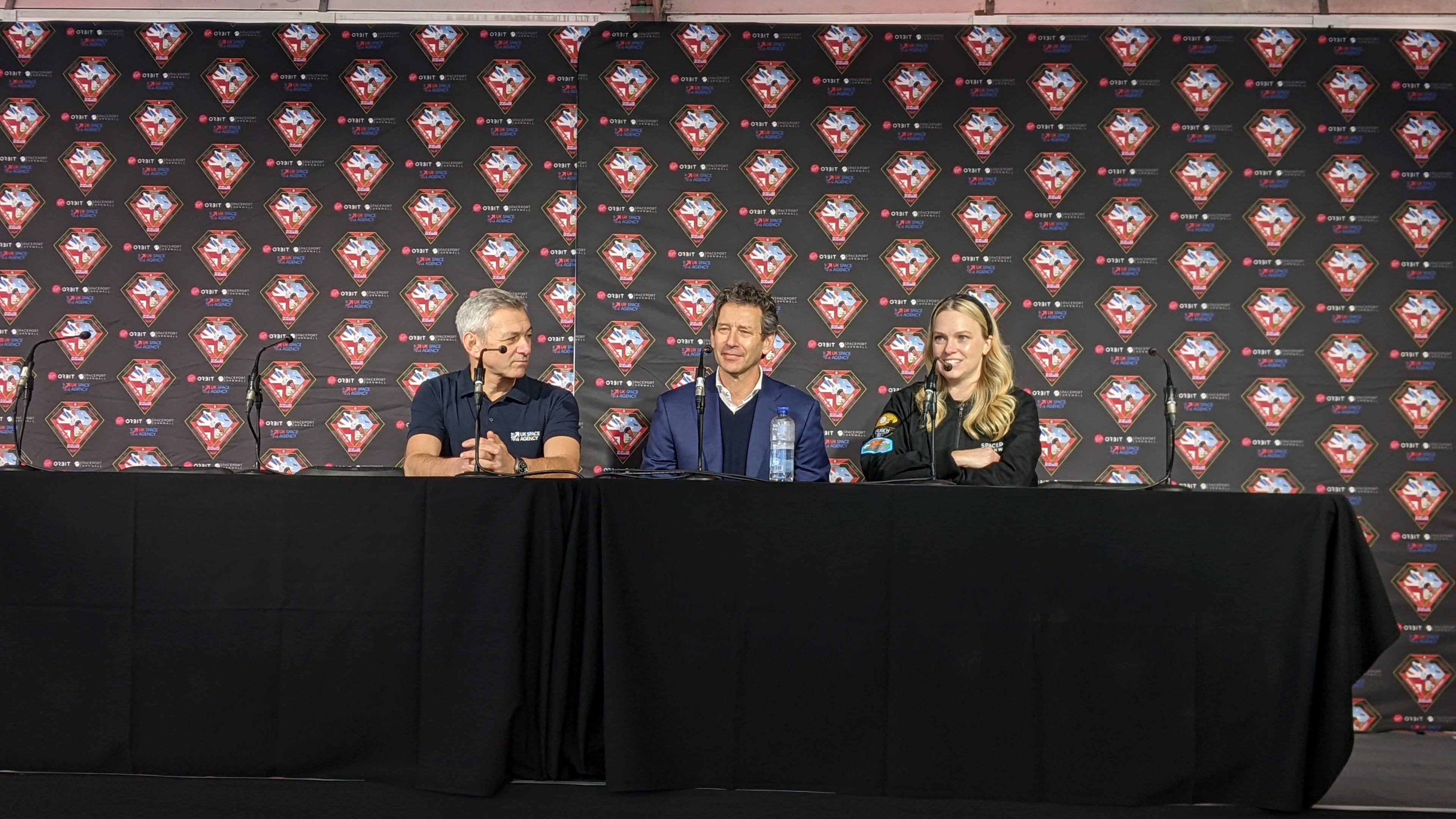 Ian Annett, deputy chief executive of the UK Space Agency, Dan Hart, Virgin Orbit CEO and Mellisa Thorpe, the CEO of Spaceport Cornwall, at the Start Me Up press conference on Sunday (Jan. 8).