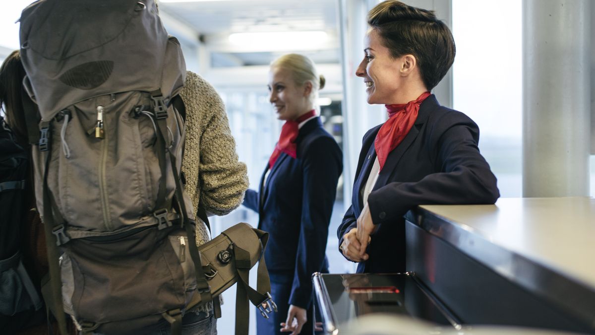 Backpacker boarding on airline gate