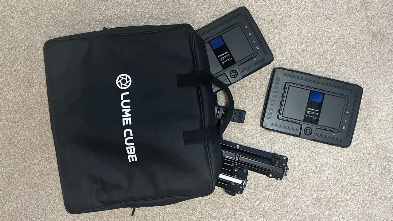 Lume Cube Studio Panel Lighting Kit bag with kit falling spread onto floor