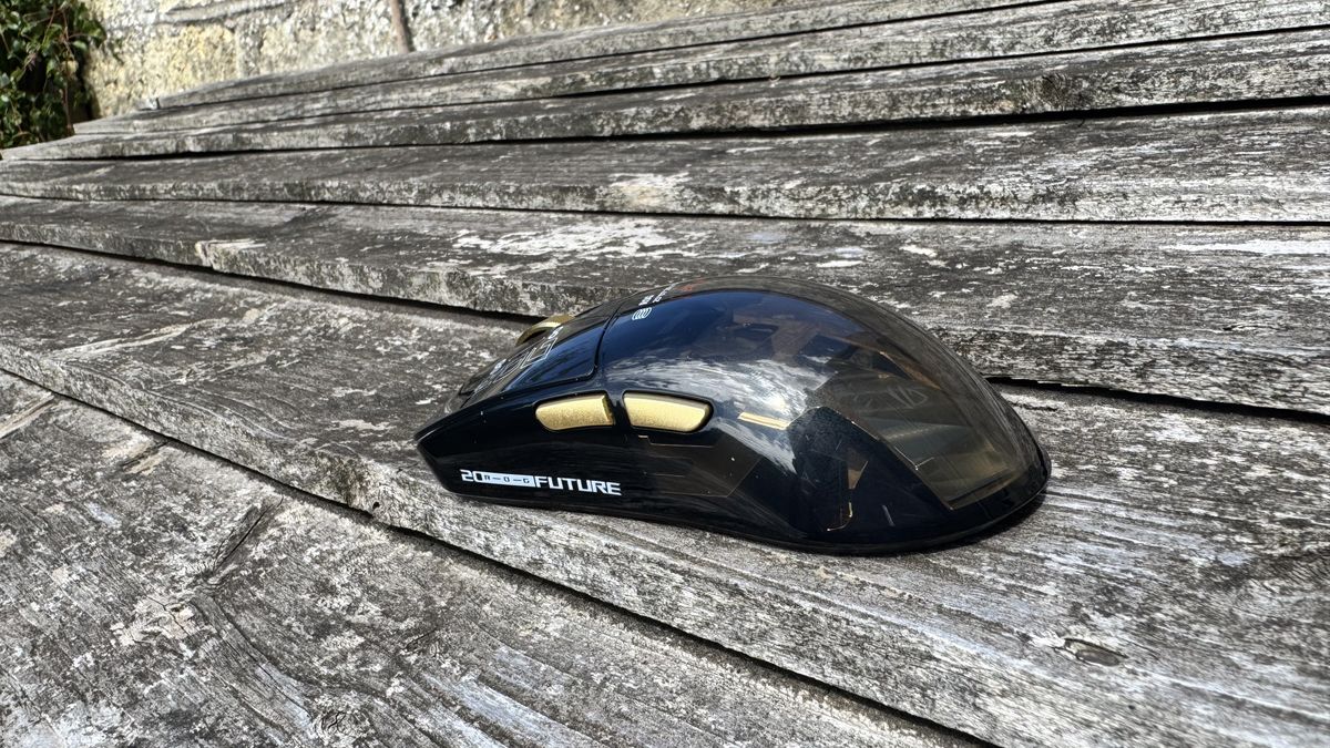 Asus ROG Harpe II Extreme Edition 20, on top of wood, from the back left