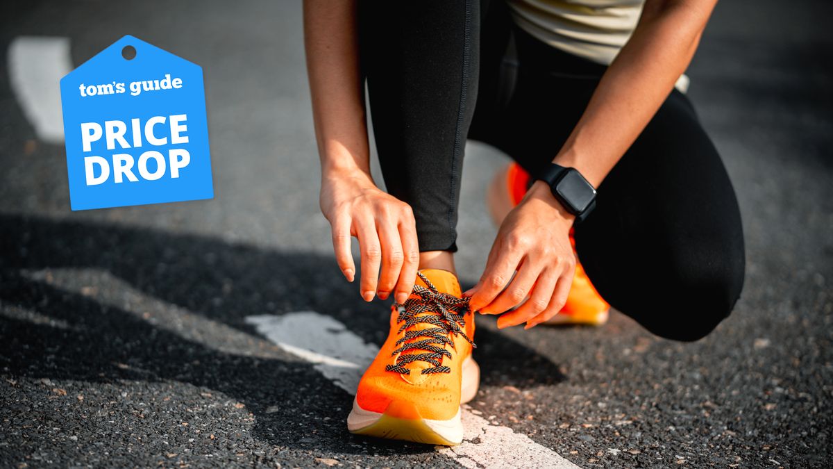 Person tying their shoe lace