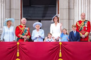 Camilla, Duchess of Cornwall, Prince Charles, Prince of Wales, Queen Elizabeth II, Prince Louis of Cambridge, Catherine, Duchess of Cambridge, Princess Charlotte of Cambridge, Prince George of Cambridge and Prince William, Duke of Cambridge on the balcony of Buckingham Palace watch the RAF flypast during the Trooping the Colour parade on June 02, 2022 in London, England.