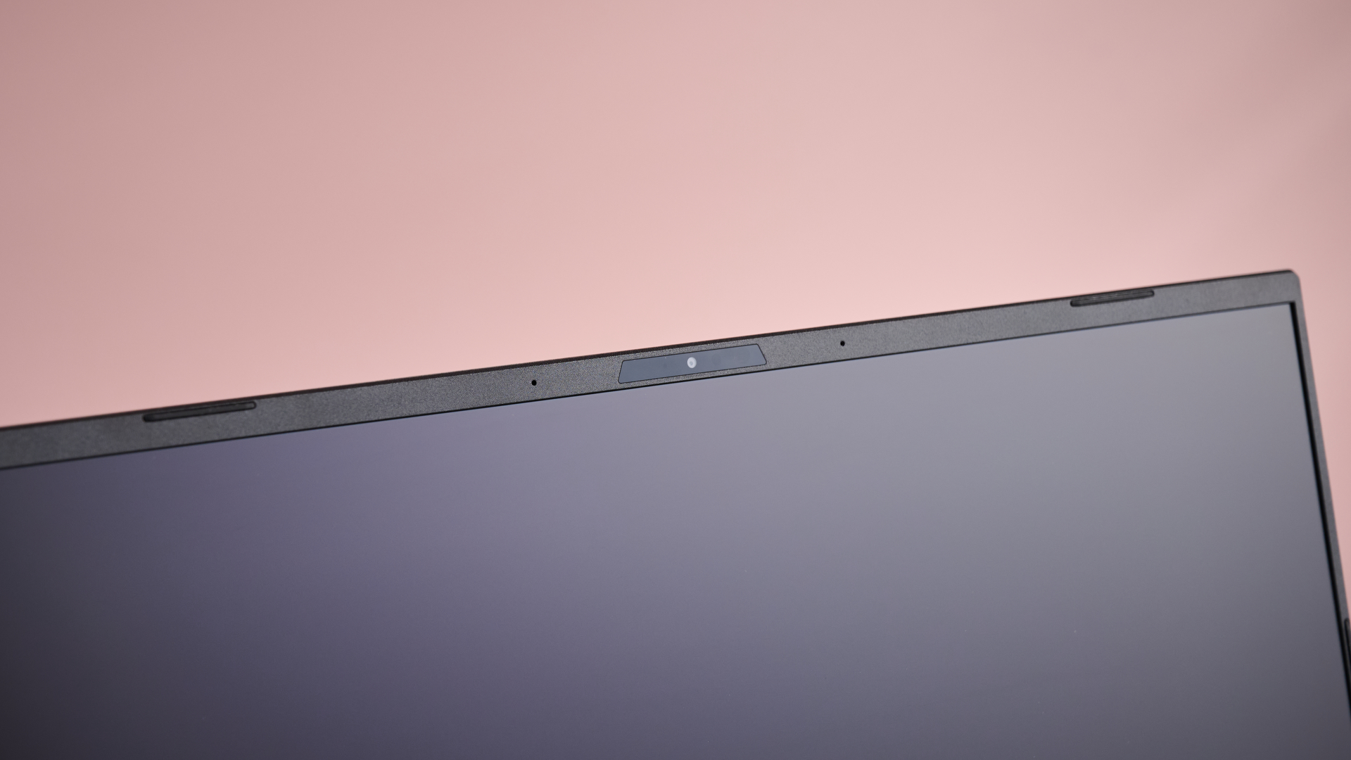 Close-up of webcam on ASUS TUF Gaming A16 (2025), with pink background