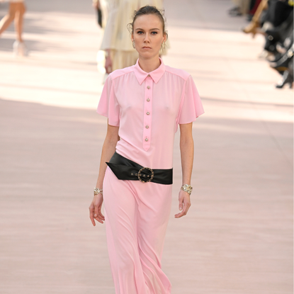 Woman wearing a powder pink dress