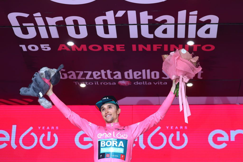 PASSO FEDAIA ITALY MAY 28 Jai Hindley of Australia and Team Bora Hansgrohe celebrates at podium as Pink Leader Jersey winner during the 105th Giro dItalia 2022 Stage 20 a 168km stage from Belluno to Marmolada Passo Fedaia 2052m Giro WorldTour on May 28 2022 in Passo Fedaia Italy Photo by Michael SteeleGetty Images
