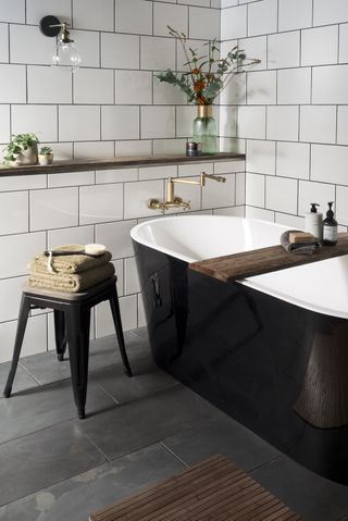 honed gloss black slate natural stone in a bathroom