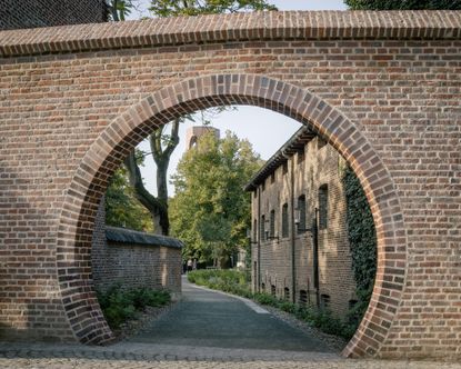 Hasselt Beguinage by David Kohn, a geometric brick structure that looks subtle but full of personality