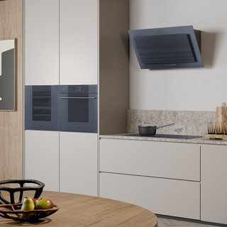 Kitchen with built-in Smeg ovens, hob and cooker hood