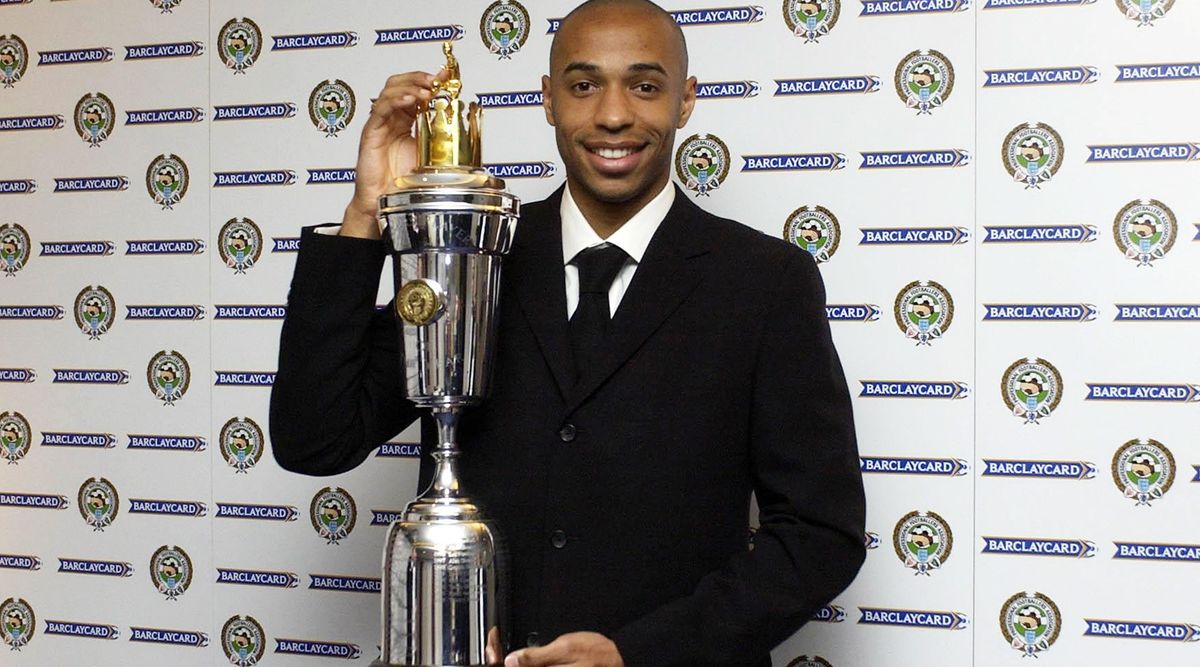 LONDON - APRIL 25: Thierry Henry of Arsenal poses with the PFA Players Player Of The Year Award at the PFA Awards Dinner at the Grosvenor House Hotel on April 25, 2004 in London. (Photo by John Stillwell-Pool/Getty Images)