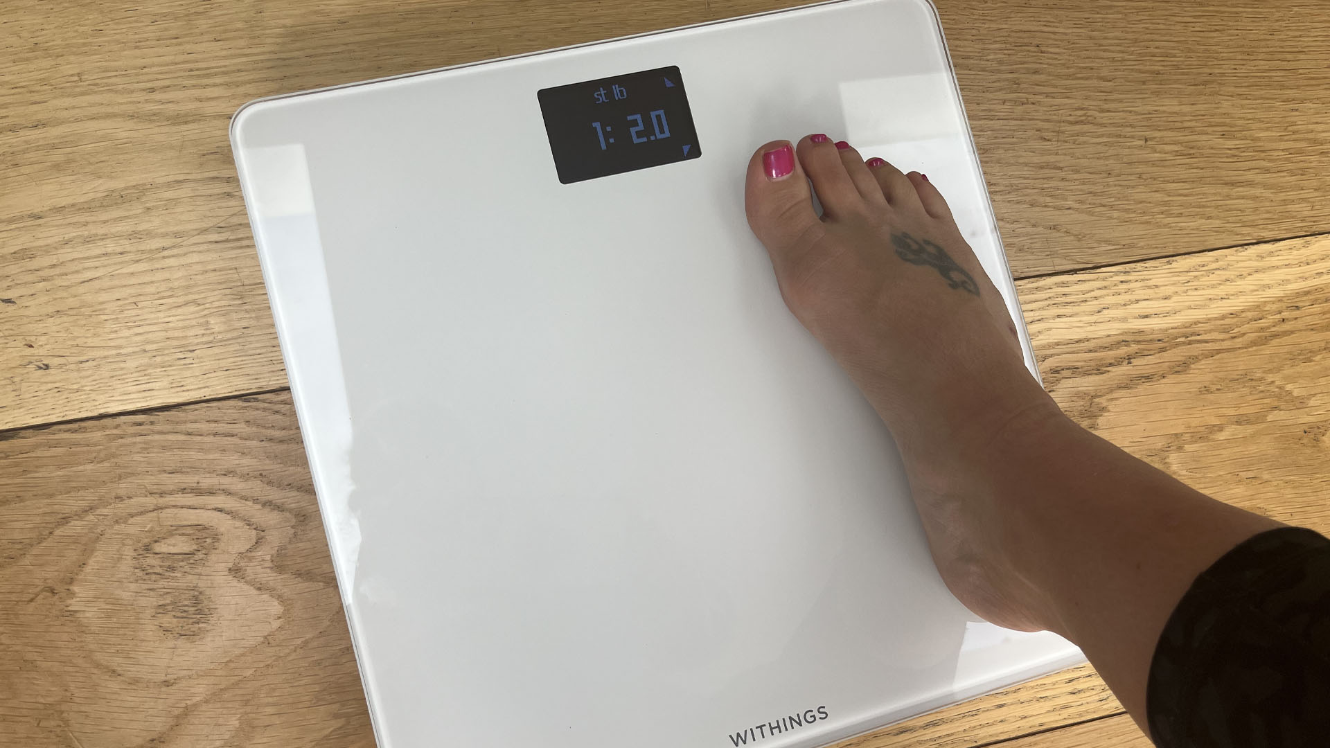 Withings Body smart scale being used by Live Science contributor Maddy Bidulph
