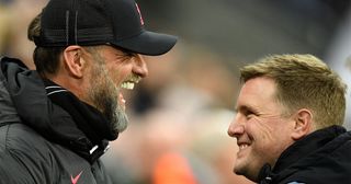 Liverpool and Newcastle managers Jurgen Klopp and Eddie Howe react during the English Premier League football match between Newcastle United and Liverpool at St James' Park in Newcastle-upon-Tyne, north east England on February 18, 2023. 