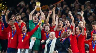 Spain&#039;s squad celebrates their 2010 World Cup win as Iker Casillas lifts the trophy in South Africa in July 2010.