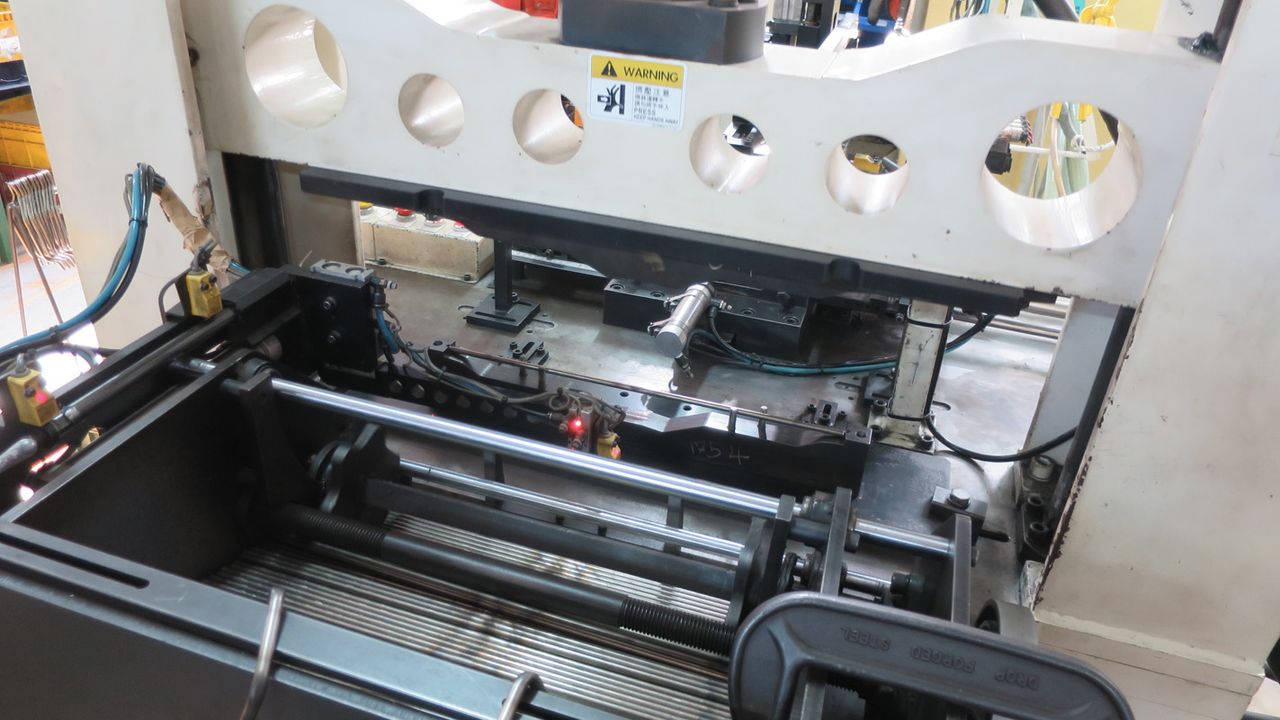 Cut rail sections are laser aligned in the press before being shaped
