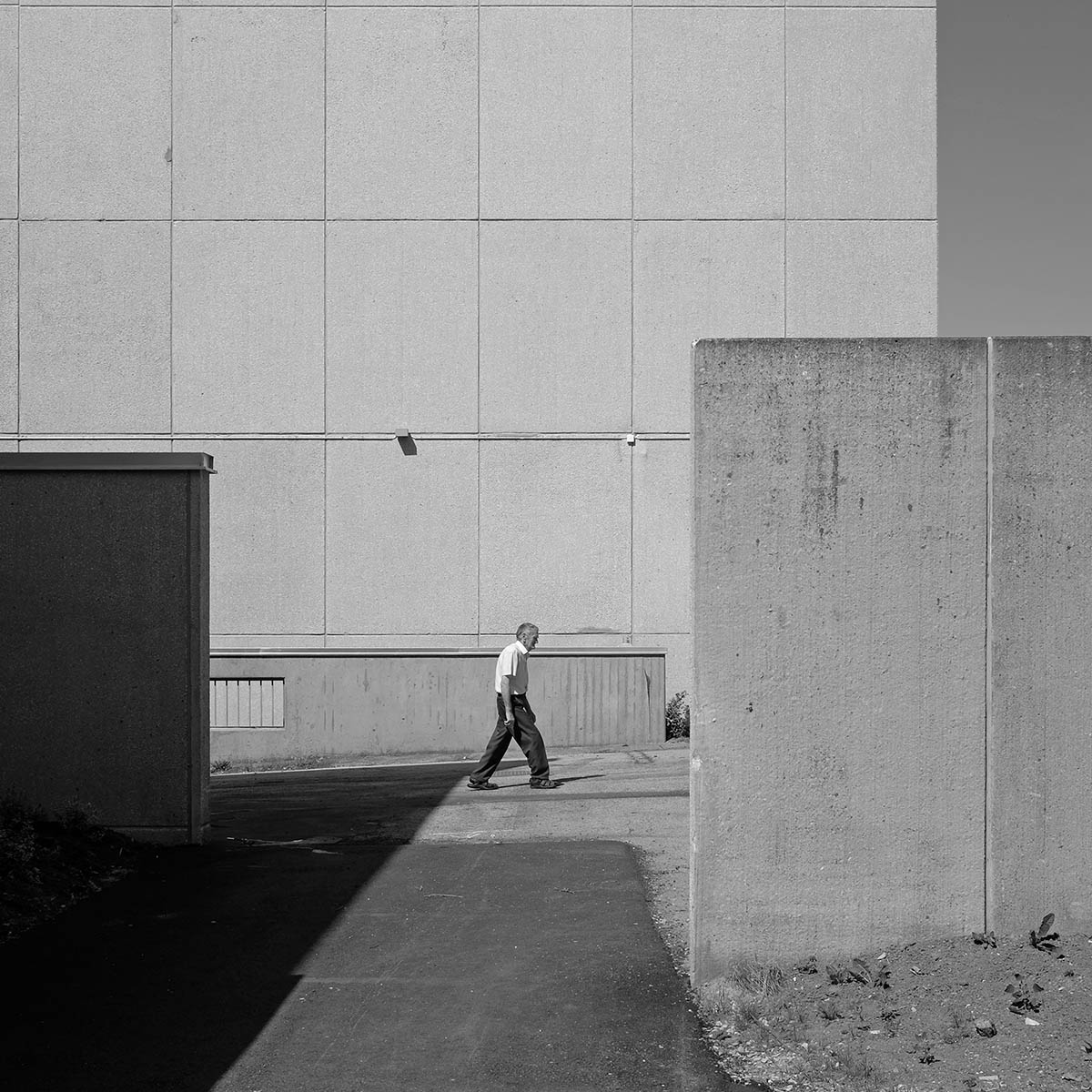 Man walking down an empty street