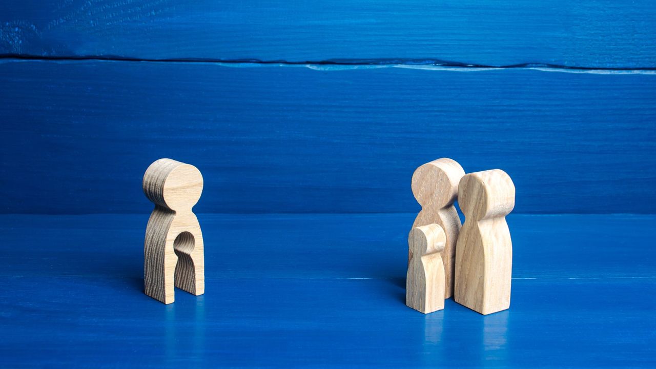 wooden figures representing childlessness