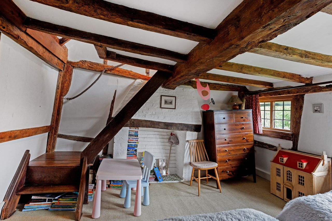Images of a very wonky house called The Cottage