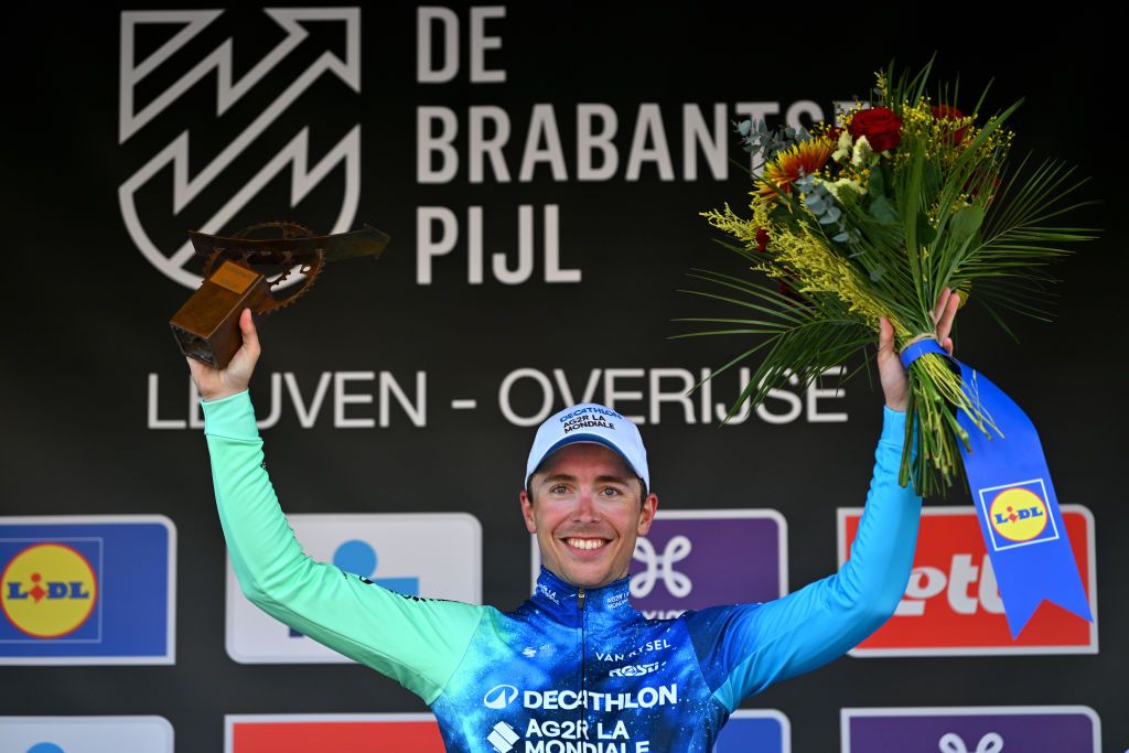 OVERIJSE BELGIUM APRIL 10 Benoit Cosnefroy of France and Decathlon AG2R La Mondiale Team celebrates at podium as race winner during the 64th De Brabantse Pijl La Fleche Brabanconne 2024 Mens Elite a 1952km one day race from Leuven to Overijse on April 10 2024 in Overijse Belgium Photo by Luc ClaessenGetty Images