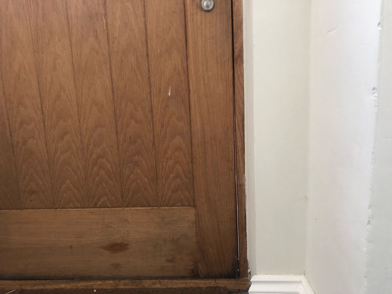 The exterior door with a large gap where there was a draught being the foam tape was added