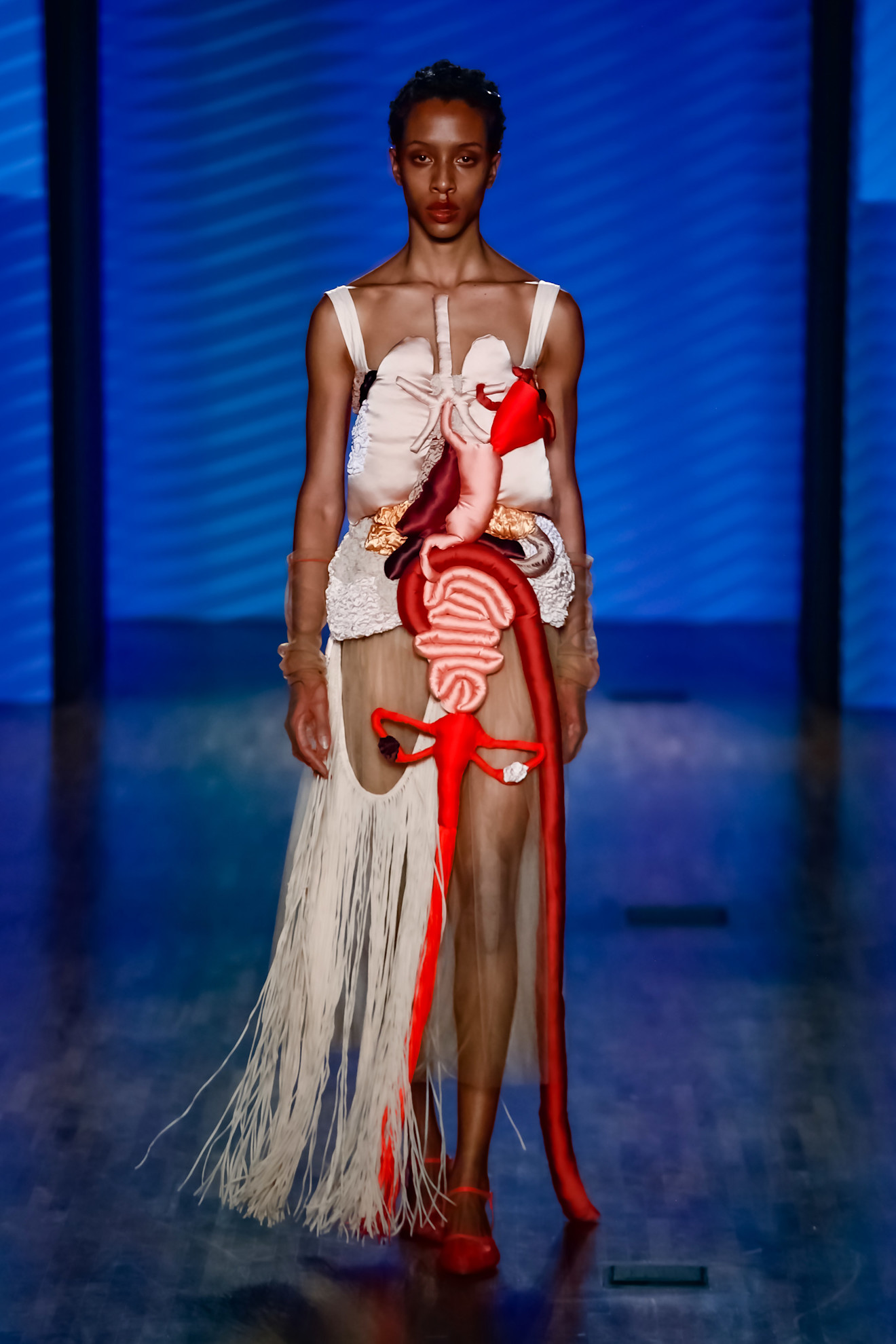 A model wore a Renata Buzzo anatomical dress on the Spring 2025 runway