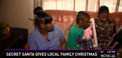 The Carolina Panthers' defensive line coach bought Christmas presents for local family that was robbed