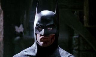 Michael Keaton's Dark Knight looks to his left in 1989's Batman movie