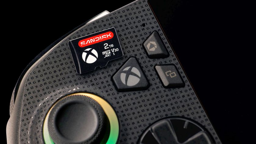 A Sandisk MicroSD card resting on top of the ROG Xbox Ally.