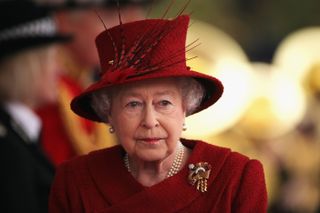 Queen Elizabeth II arrives to greet the Emir of Qatar