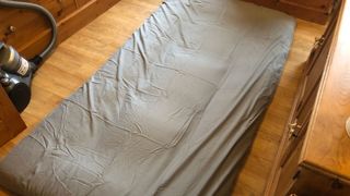 The Maxyoyo Japanese Floor Mattress in its dustproof cover