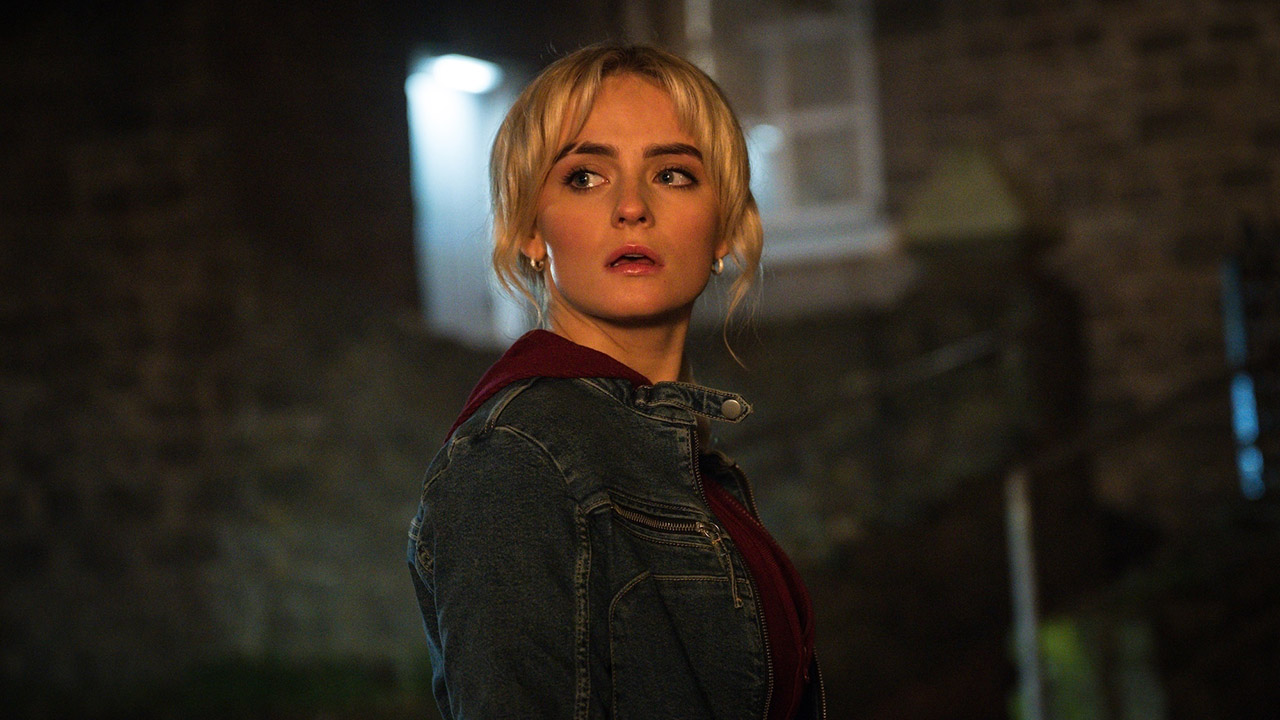 Ruby Sunday standing on a street at night in Doctor Who season 2