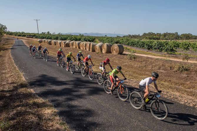 Elite women's leader Angelika Tazreiter follows Stijn Van Boxstael on stage 6 of the 2019 Crocodile Trophy