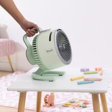 shark flexbreeze hydrogo fan in mint in a kids playroom