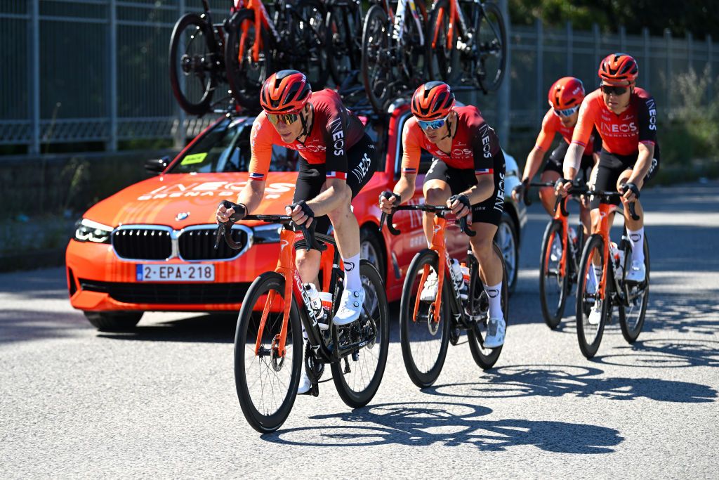 Geraint Thomas chased back into the field on the wheel on his Ineos Grenadiers teammates after a crash