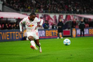 Ridle Baku of RB Leipzig controls the ball during the 1. Bundesliga match between RB Leipzig and Borussia Dortmund at Red Bull arena, Leipzig, Germany on March 15, 2025.