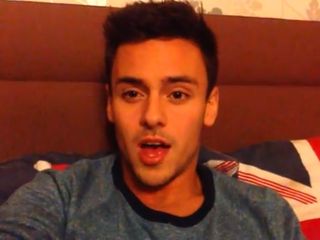 Tom Daley talks to the camera in a personal video message
