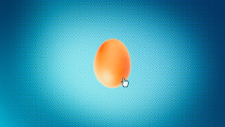 Chicken egg icon on computer screen with mouse pointer