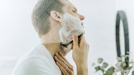 A man shaving his face