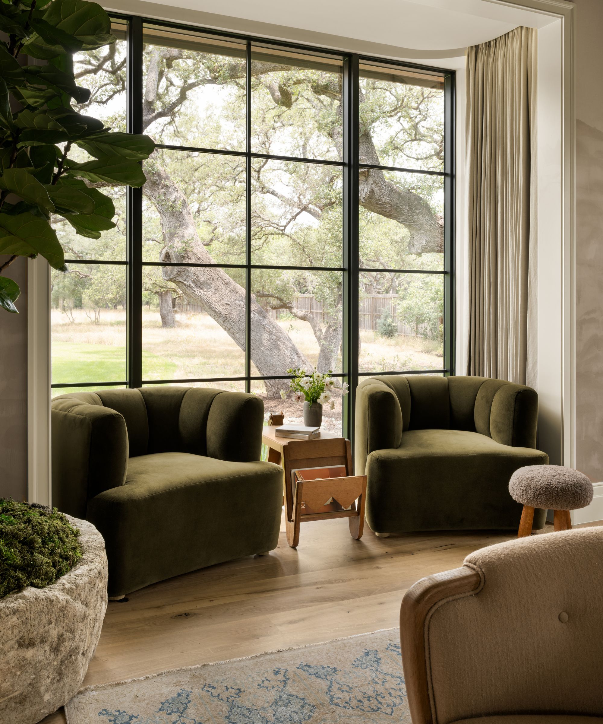 the serene modern rustic primary bedroom of Studio McGee's The Oaks house tour